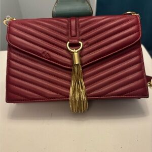 INC International Concepts Burgundy Crossbody Bag with Gold Tassel